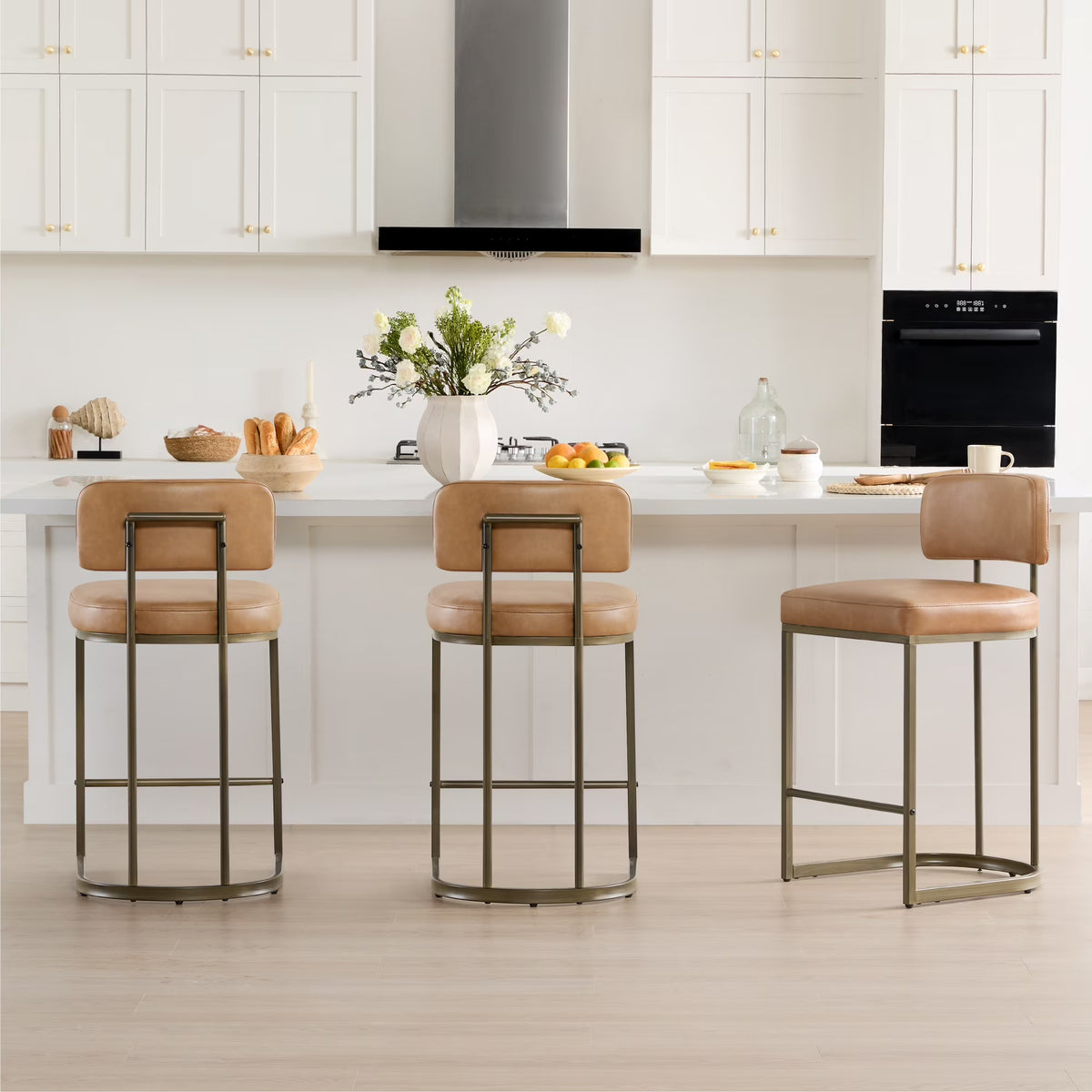 CHITA 26 inch Counter Height Bar Stool Set with Brass Frame Set of 3, Faux Leather in Cognac